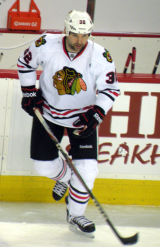 John Scott with the Chicago Blackhawks. Image courtesy of Wikimedia Commons.